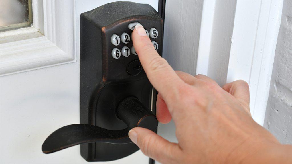 Entering key code pin on a push button doorknob