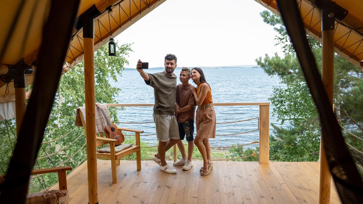 Happy family making selfie at a vacation home